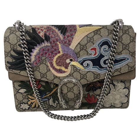 gucci motiff bird design bag|Gucci.